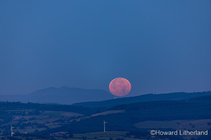 Supermoon setting over the Vale of Clwyd, North Wales