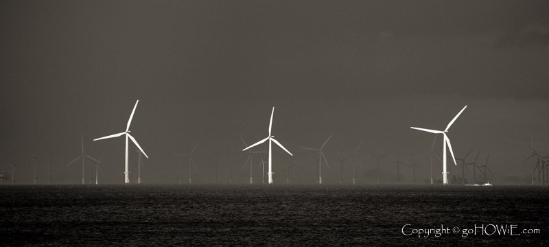 Three turbines forming part of the Colwyn Bay windfarm off the North Wales coast